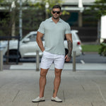 Stylish Mens Summer Polo Shirt Outfit 2025 Light Blue with white chino shorts