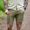 Man wearing 7" Inseam Khaki Stretch Chino Shorts